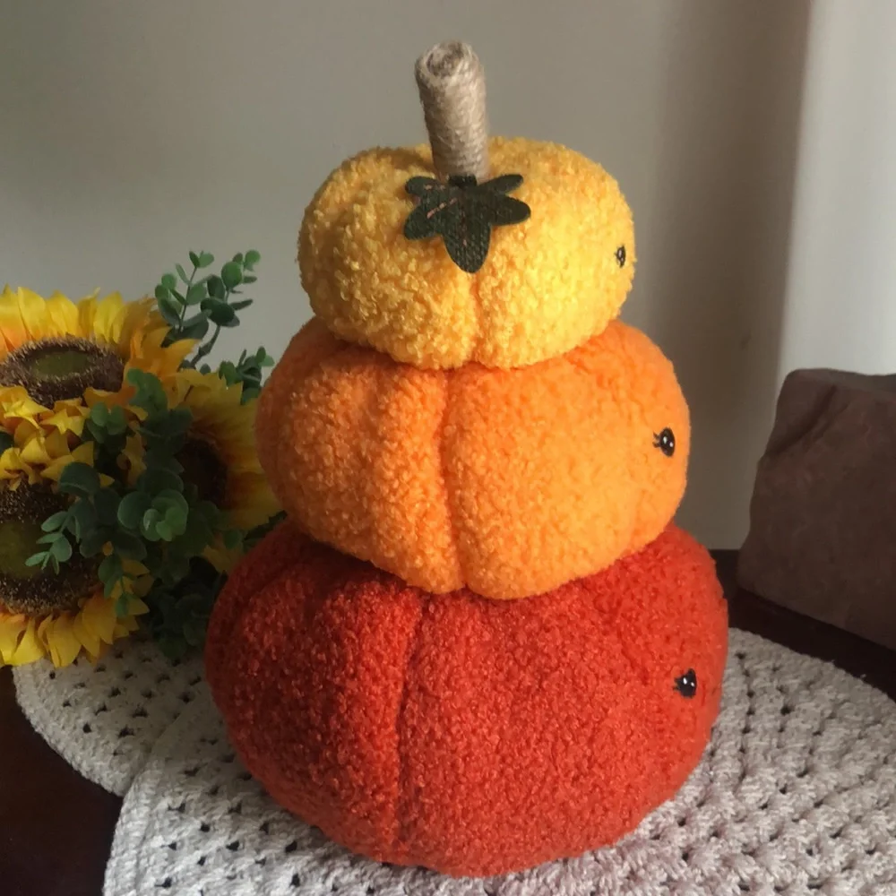 Stacked SHERPA Pumpkins with Smiley Faces